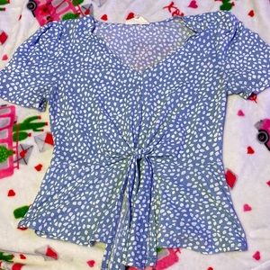 blue top, with a cheetah print pattern